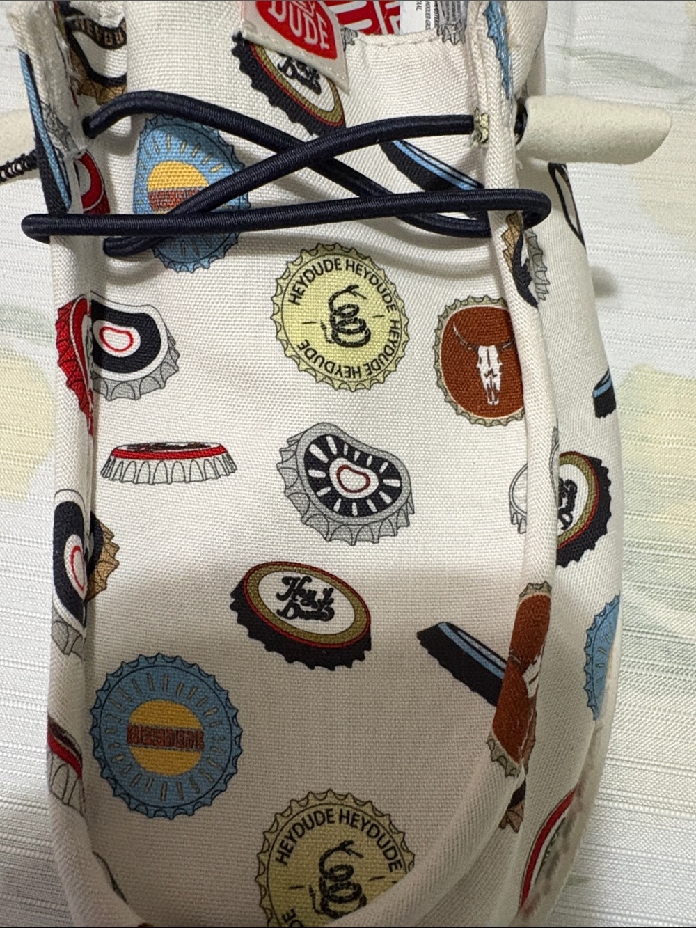 Hey Dude Men’s 8/Woman’s 10 Slip-On with Multicolor Bottle Cap Print - Picture 5 of 5